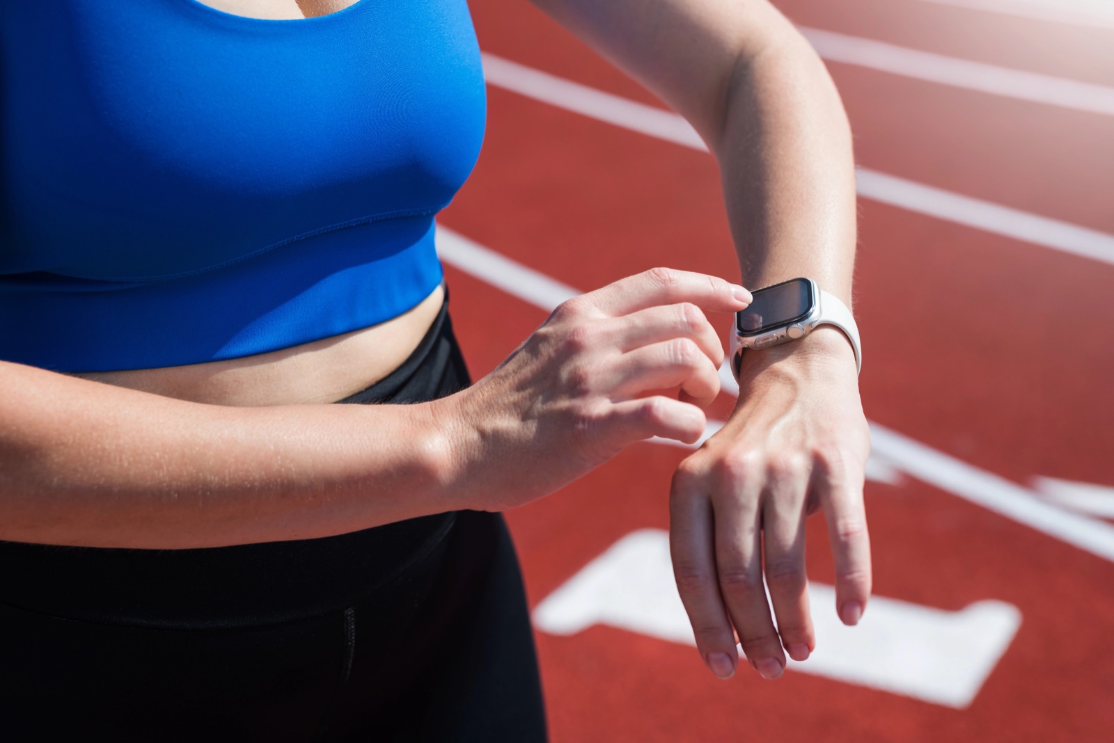 Person setting fitness goals on Apple Watch before a walk